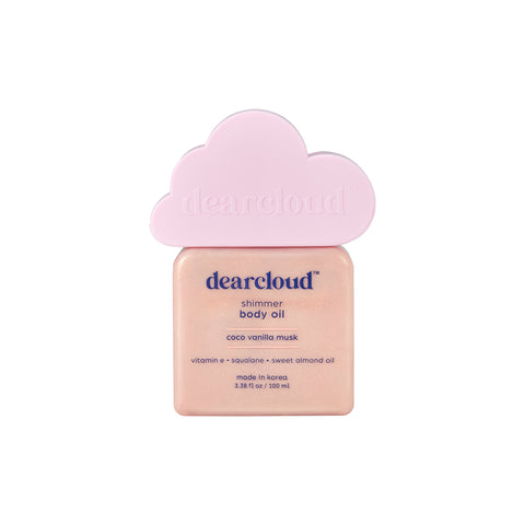 Square bottle of dearcloud Shimmer Body Oil with a pink cloud-shaped cap.  Shimmer is rosy warm-toned gold for all skin types.