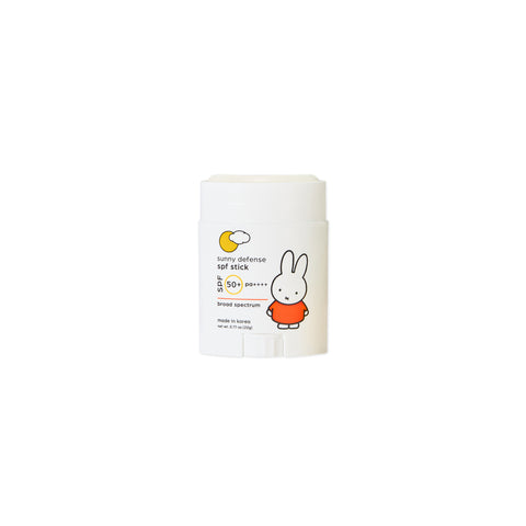 White packaging with Miffy character in orange dress. Formula stick is white and applies clear.