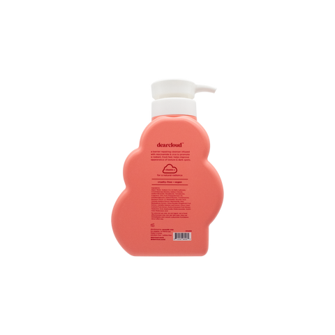 Peach-colored bottle of dearcloud Daily Glow Body Wash with a pump dispenser.