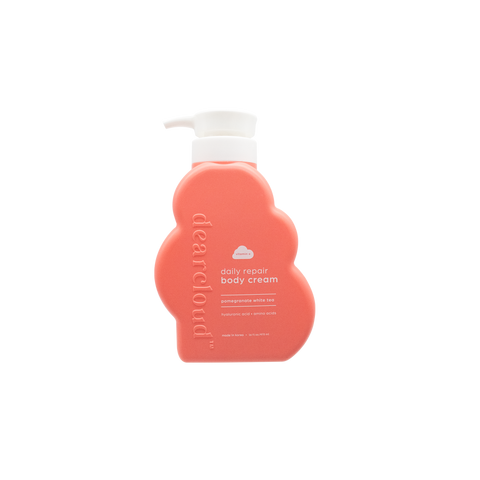 Peach-colored bottle of dearcloud Daily Repair Body Cream with a  white pump dispenser.

