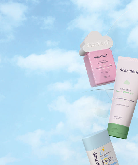 Floating dearcloud skincare products including cleanser, sun stick, collagen cream, and facial cleanser